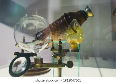 Magnifying lens of the microscope. Old iron microscope with magnifying lenses.