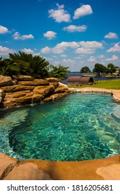 Magnolia, Texas / United States Of America - June 25 2015: Backyard Swimming Pool Next To Lake In Texas