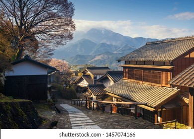 Magome juku preserved town in Nakasendo with central alps mountain at sunrise, Kiso valley in  Nakatsugawa, Gifu Prefecture, Japan. Famous travel landmark of old Japanese town. - Powered by Shutterstock