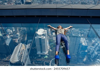 Mahanakhon Tower Bangkok's glass-floored observation deck is cantilevered out of the building to give visitors direct downward views of 300m. - Powered by Shutterstock