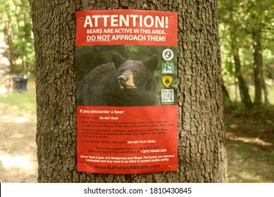Mahwah, NJ - August 30 2020: A New Jersey Fish And Wildlife Division Public Service Announcement Sign Warning Hikers Of Black Bear Activity At The Ramapo Valley County Reservation 