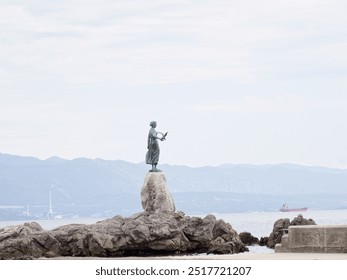 Maiden with a seagull statue - Powered by Shutterstock