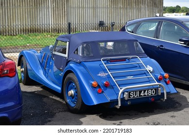 MAIDENHEAD, ENGLAND - 09 07 2022: Rear View Of A Blue Custom Morgan Plus Four Vintage Car Parked At White Waltham Airfield