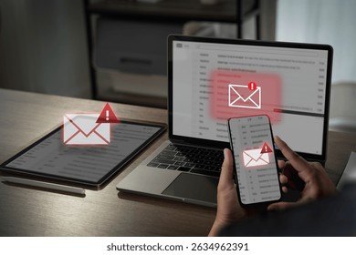 A mail alert, email hack sms spam image shows person checking email alerts multiple devices, indicating potential security or spam issues