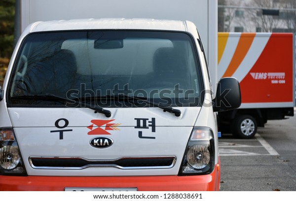 Mail delivery trucks in Korea. (Seoul, Korea. Nov. 25,\
2018) 