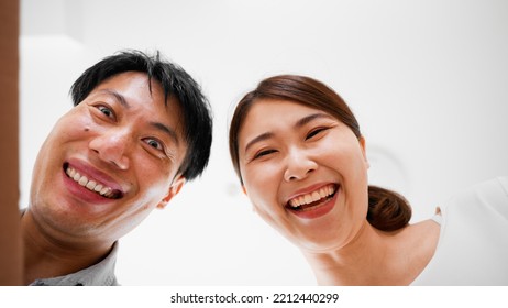 Mail Order Image Of A Woman And A Man Opening A Cardboard Box