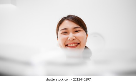 Mail Order Image Of A Woman Opening A Cardboard Box