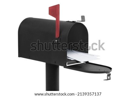 Mailbox full with envelopes, isolated on white background, red flag pointing up. Clipping paths.