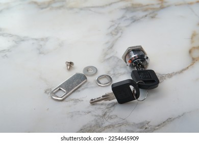 Mailbox lock and the spare part - Shutterstock ID 2254645909