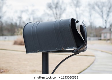 Mailbox That Has Been Hit And Damaged By Car