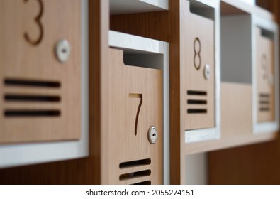 Mailboxes On The Wall In An Apartment Building. Close Up.  Mailbox Number 7.