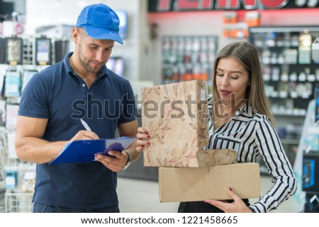 The mailboy surpriing his customer with the goods she ordered
