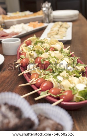 Similar – Image, Stock Photo Tomato mozzarella skewers with basil