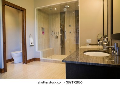 Main Bathroom With Double Steam Glass Shower Stall, Vanity And Toilet, Quebec, Canada