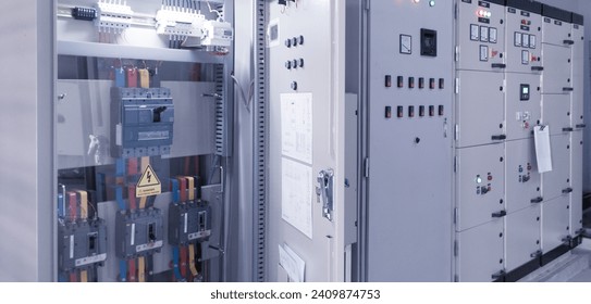 Main breaker on the distribution panel control,Electrical switch gear at Low Voltage power control center cabinet in coal power plant. - Powered by Shutterstock