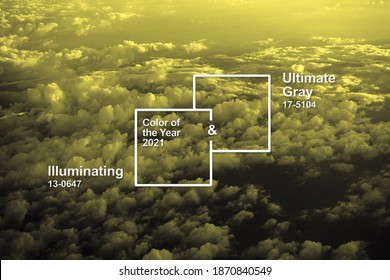 Main Colors Of The Year 2021 Pantone. Illuminating And Ultimate Gray On The Background Of The Sky With Clouds