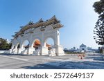 The main gate of National Chiang Kai-shek (CKS) Memorial Hall, the landmark for tourist attraction in Taiwan.  st hand holding smartphone while taking a photograph of jiufen Culture Village Taipei, 