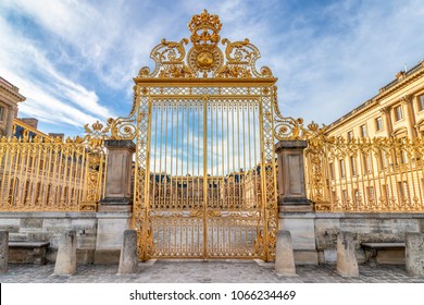 Main golden door in exterior facade of Versailles Palace, Paris, France