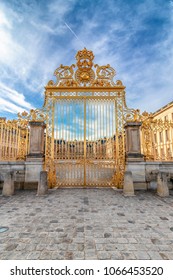 Main Golden Door In Exterior Facade Of Versailles Palace, Paris, France