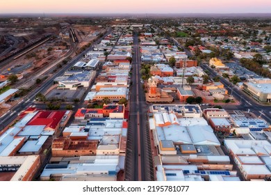 Main Shopping Administrative Street In Broken Hill Mining Town Of Rural Outback Australia - Aerial Sunrise View.