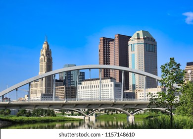 The Main Street Bridge Is A Major Landmark In Downtown Columbus, Ohio.  The Scioto Mile Park Adds Green Space To This Skyline.