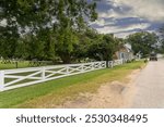 Main Street of historic Yorktown Village, Virgina. Mobjack Coffee Roasters and Petite Cafe in Cole Digges House c 1726. Yorktown Battlefield, part of Colonial National Historical Park. Steamer wagon.