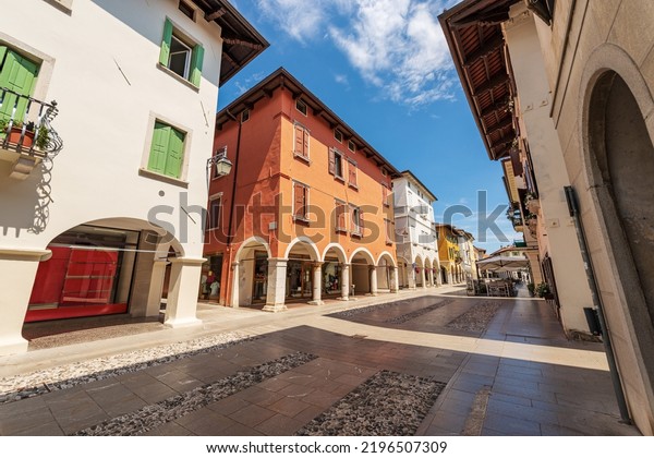 Main street in\
Spilimbergo downtown, called Corso Roma (Rome Street). Town of\
medieval origins, Pordenone province, Friuli-Venezia Giulia, Italy,\
southern Europe.