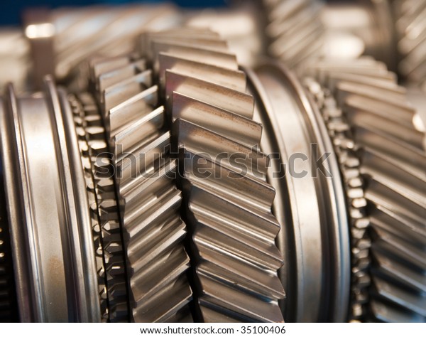 Mainshaft and Countershaft of a transmission with\
gears meshing. Focus on the\
gears.