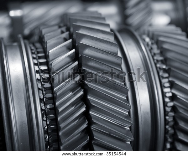  Mainshaft and Countershaft of a\
transmission with gears meshing. Focus on the\
gears.