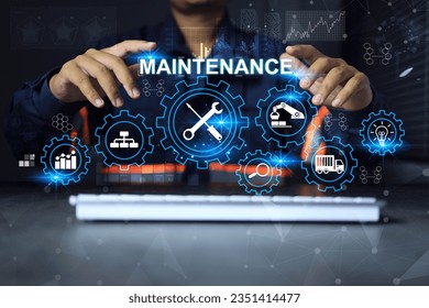 Maintenance engineer working on desk in office with gears graphic signifies maintenance or inspection of machinery according to service intervals periods and corrective and preventive maintenance.