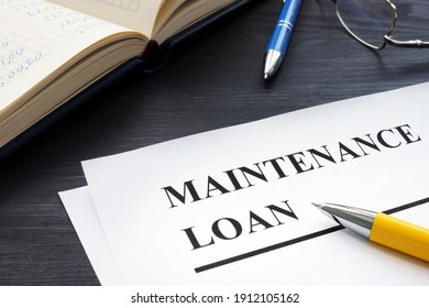 Maintenance loan application form for student and pen.