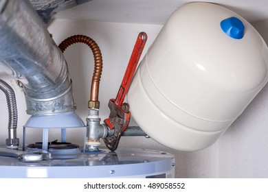 Maintenance On A Hot Water Heater Compression Tank