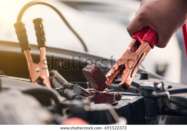Maintenance\
repair engine in a car repair shop. Close\
up