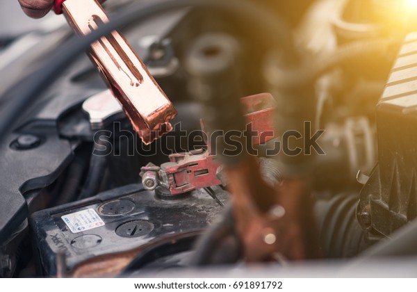 Maintenance\
repair engine in a car repair shop. Close\
up