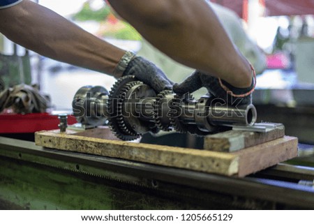 Maintenance technician repair lathe machine
