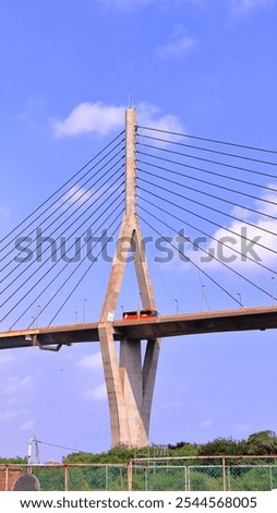 Maintenance work on the upper part of the main portico of the Tampico bridge, sandblasting work at height.