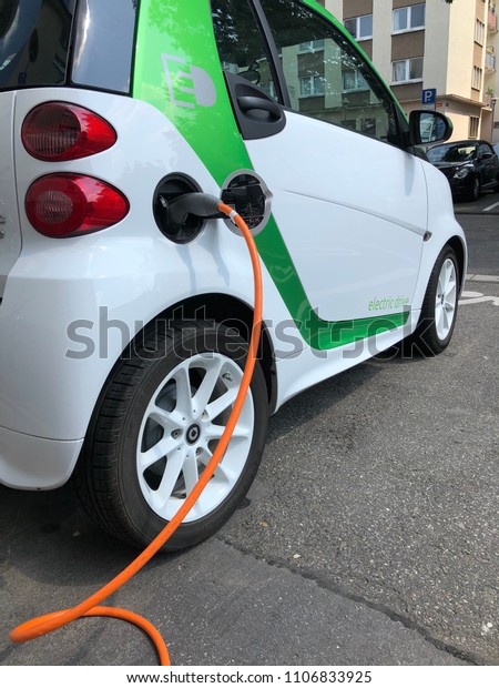 Mainz, Germany- June 06, 2018:\
electric car being charged at a charging point in Mainz,\
Germany