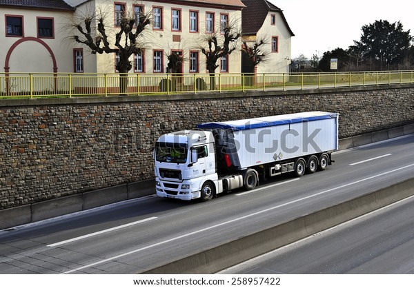 MAINZ,GERMANY-FEB 09:MAN truck on the highway on\
February 09,2015 in Mainz,Germany.MAN SE, formerly MAN AG, is a\
German mechanical engineering company and parent company of the MAN\
Group.