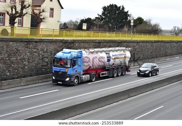 MAINZ,GERMANY-FEB 09:mercedes benz oil truck on the\
highway on February 09,2015 in Mainz,Germany.MB is a German\
automobile manufacturer, a multinational division of the German\
manufacturer Daimler\
AG.