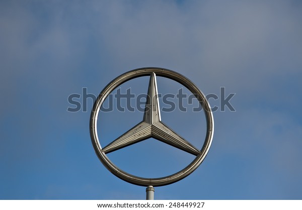 MAINZ,GERMANY-JAN 30:Mercedes-Benz logo in the blue\
sky on January 30,2015 in Mainz,Germany.Is a German luxury\
automobile manufacturer, a multinational division of the German\
manufacturer Daimler\
AG