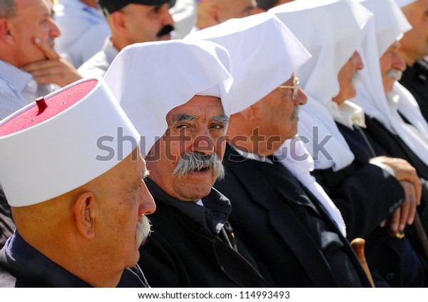 MAJDAL SHAMS,ISRAEL - SEP 03 2009: Communal Druze\
leaders from Majdal Shams,Israel.The number of Druze people\
worldwide exceeds one million, with the vast majority residing in\
the Middle East.
