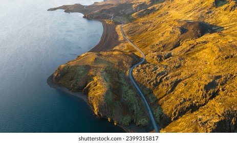 Majestic Aerial Flight Through Epic Iceland Landscape Mountain, Road and Ocean at Golden Hour Sunset Colours Scandinavian Landscape Amazing Nature, drone footage.  - Powered by Shutterstock