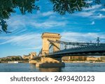 The majestic Széchenyi Chain Bridge spans the River Danube between Buda and Pest, the western and eastern sides of Budapest, Hungary