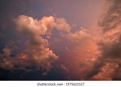 Majestic Clouds Illuminated By Sunset Light. Gloomy Rainy Sky With A Bright Cloud. Abstract Background. Picture Of Cloud Computing Concept