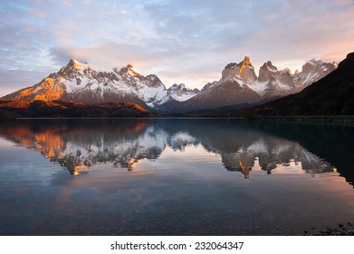 The Majestic Cuernos del Paine (Horns of Paine) reflect in lake (lago) Pehoe, Torres del Paine National Park, Patagonia, Chile
