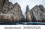 Majestic dolerite cliffs of the Tasman Peninsula, towering over the Tasman Sea