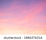Majestic dusk. Sunset sky twilight in the evening with colorful sunlight. Pastel colors. Abstract nature background. Moody pink, purple clouds sunset sky with long shutter