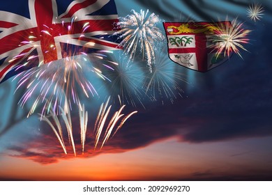 Majestic Fireworks In Evening Sky And Flag Of Fiji For Independence Day Or National Holiday