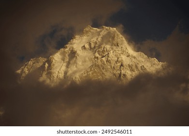 Majestic and formidable, Nanga Parbat stands as one of the most stunning mountain peaks in the world. This awe-inspiring image captures the "Killer Mountain" in all its glory, under a clear blue sky.  - Powered by Shutterstock