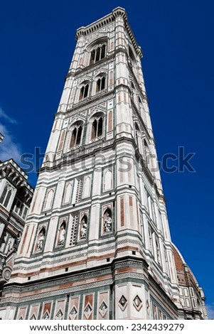 Majestic free-standing bell tower is part of the building complex of the Cathedral of Santa Maria Del Fiore and is the undisputed masterpiece of Italian Gothic. Florence, Italy.